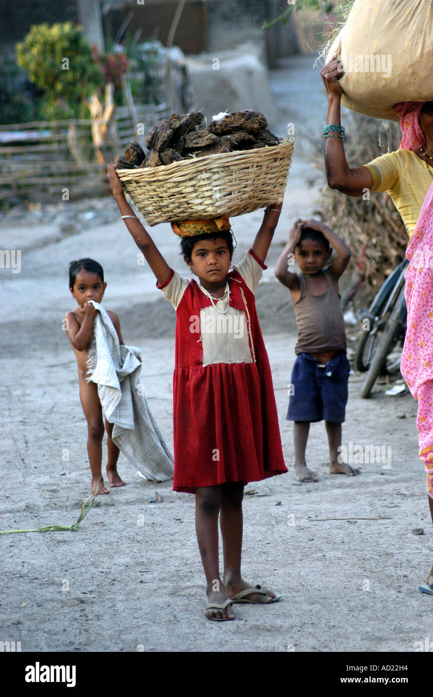 Children carrying heavy load hi res stock photography and images Alamy