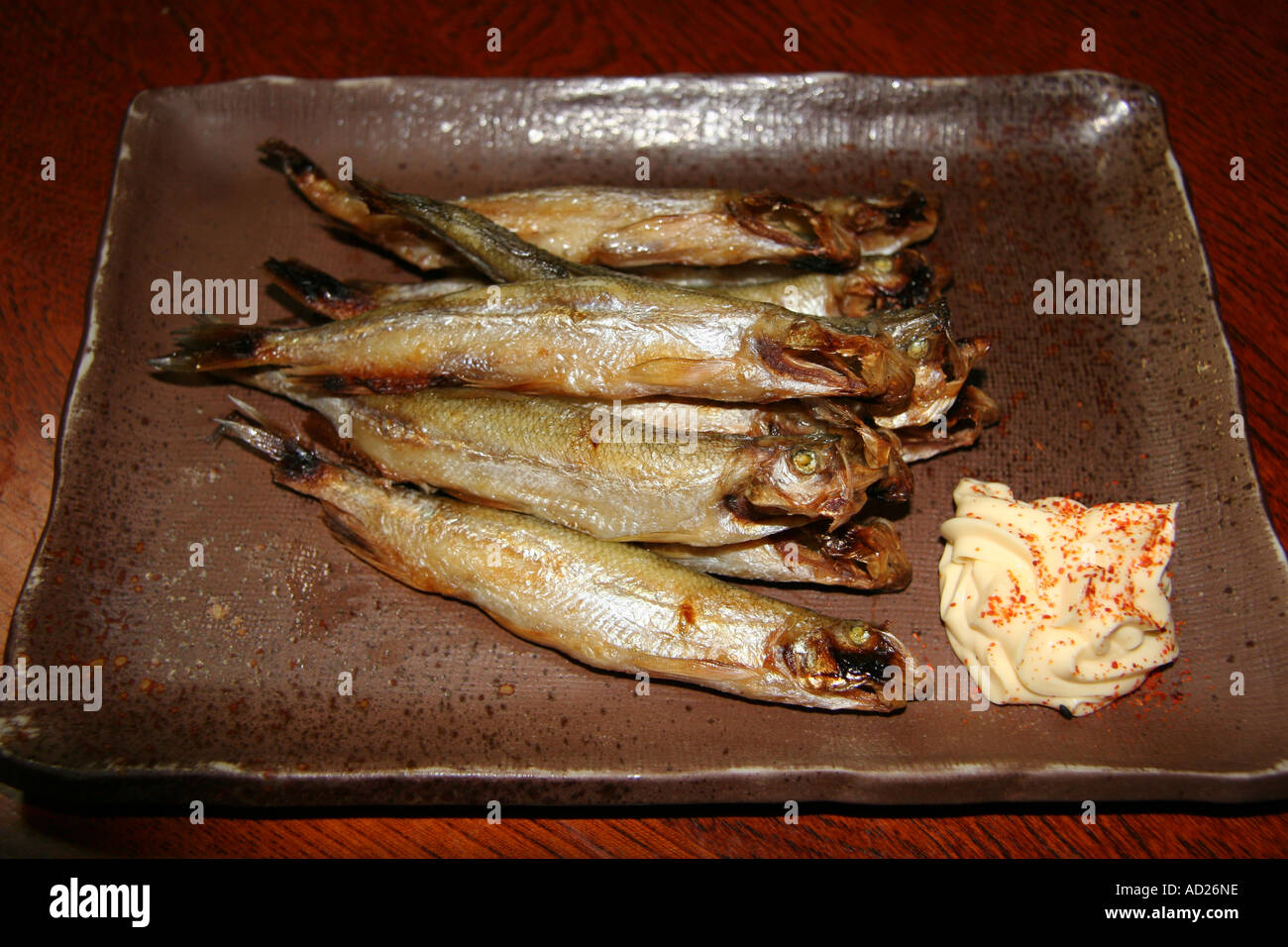 Fried fish at a Japanese izakaya Stock Photo - Alamy