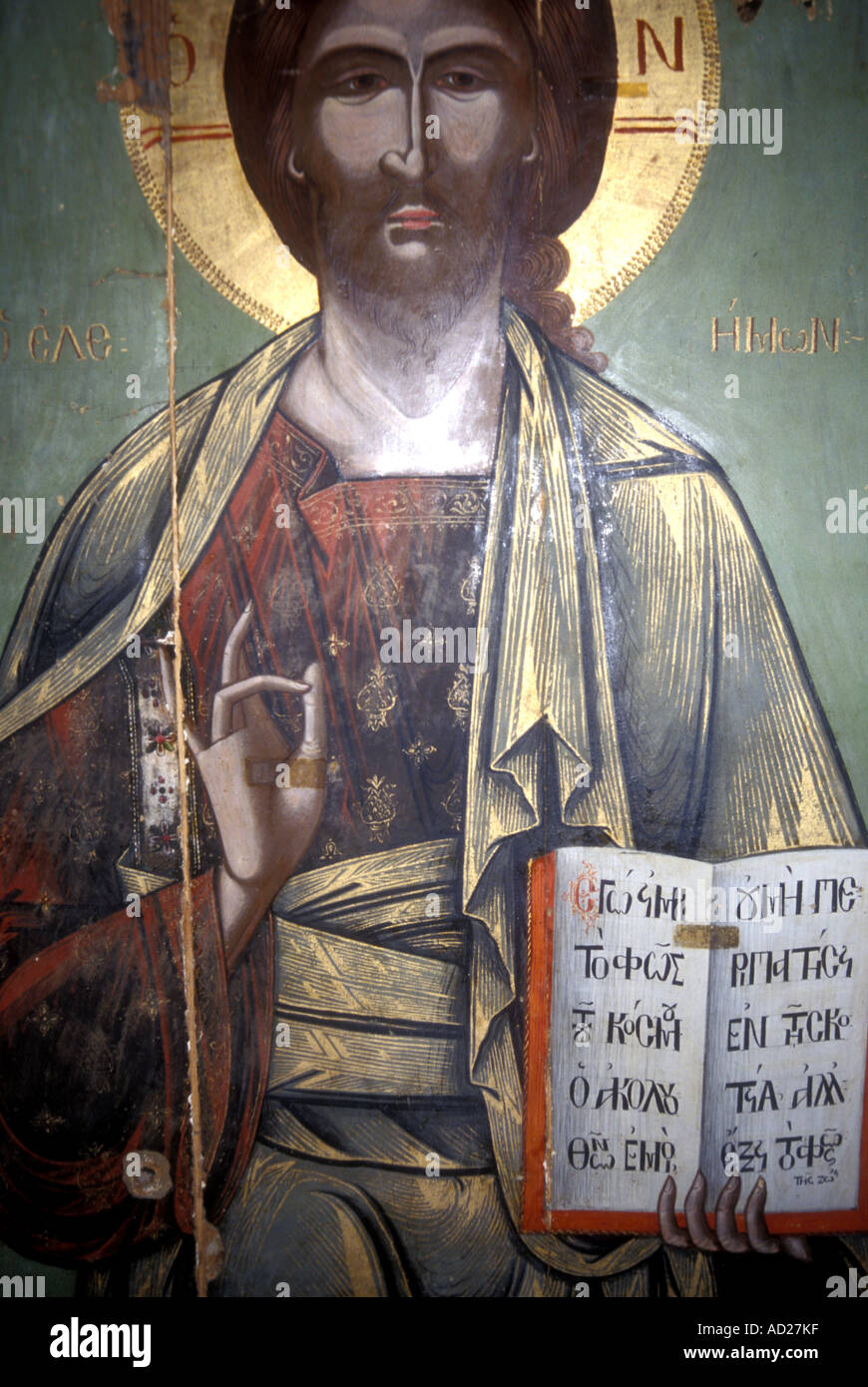 Icon of Christ holding a Greek Orthodox bible in a church in Paphos, Cyprus Stock Photo Alamy