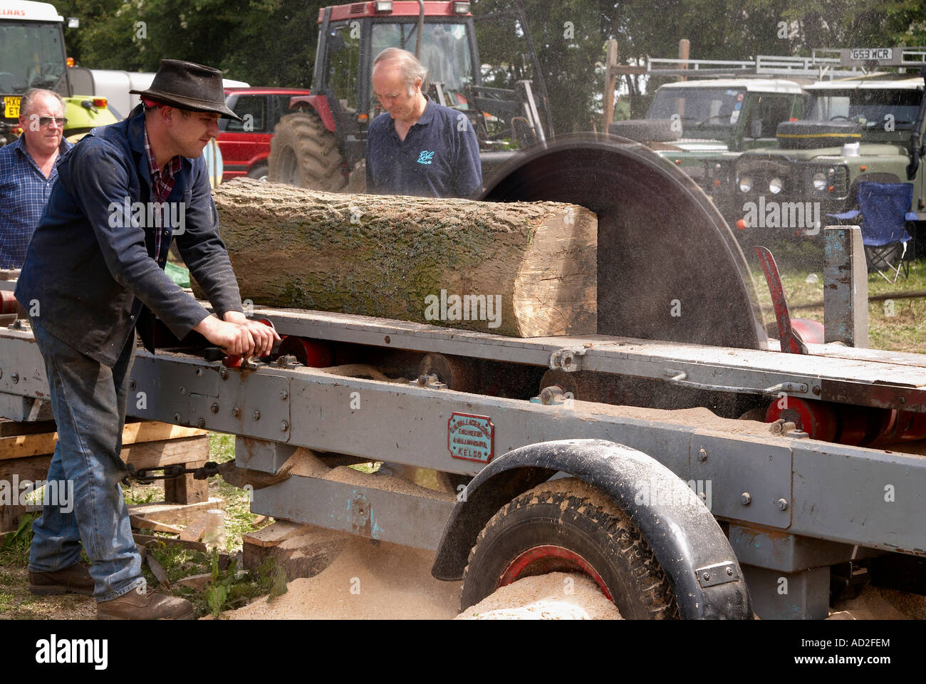 Portable steam powered saw mill demonstrated at a steam rally