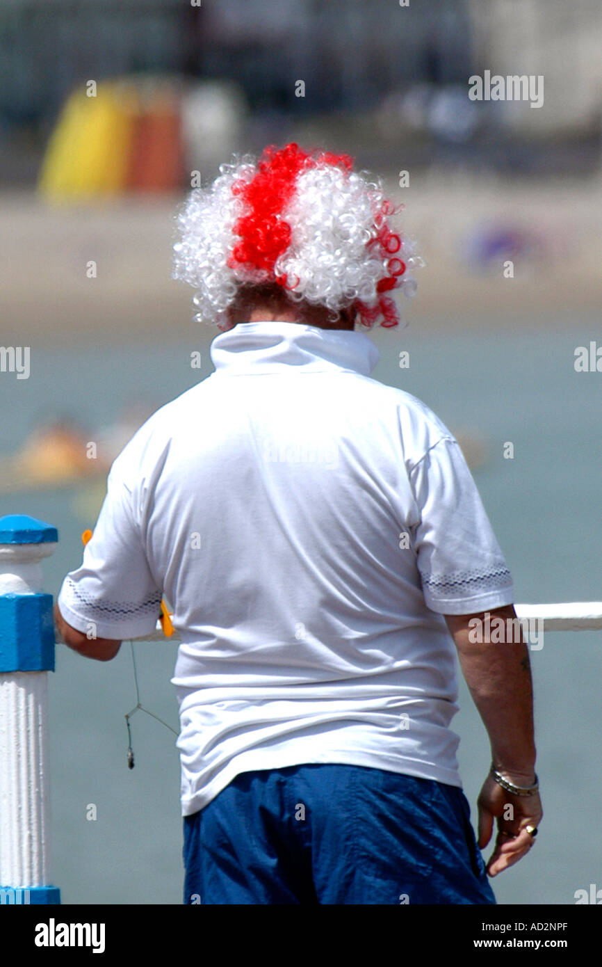 England Football supporter wearing a red and white wig. Stock Photo