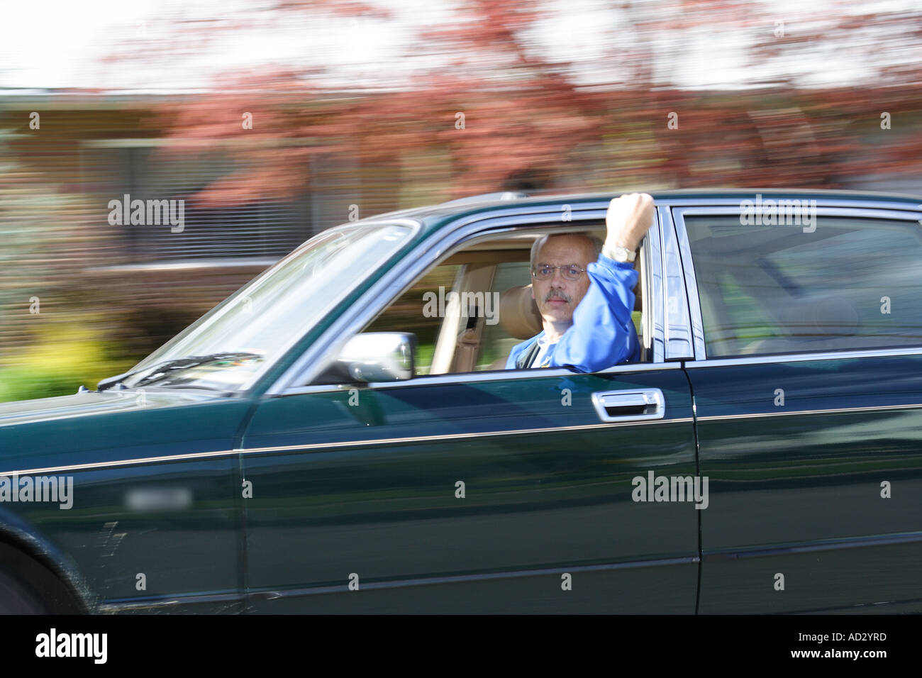 man driving in road rage Stock Photo - Alamy