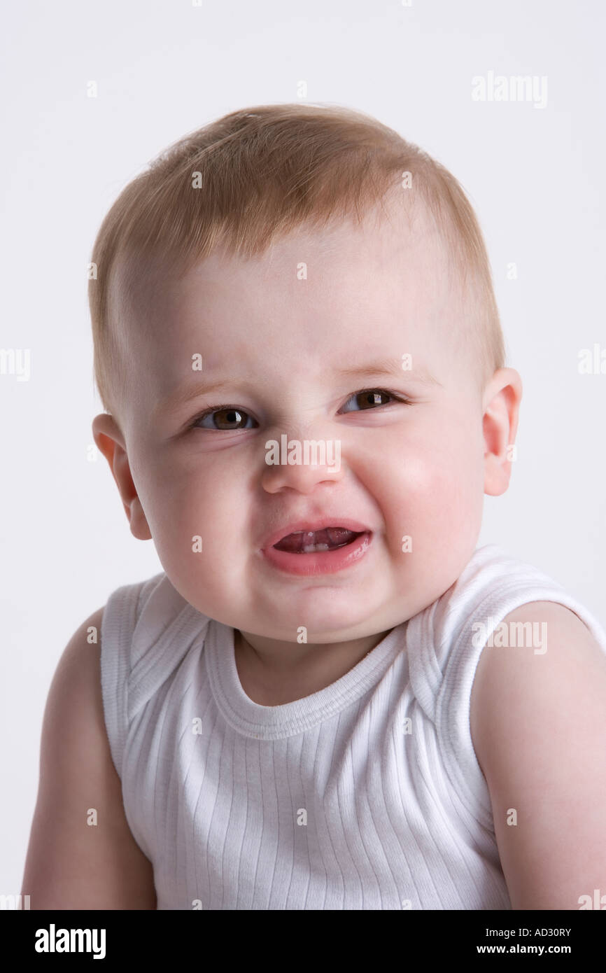 Portrait of a baby boy with a naughty expression Stock Photo
