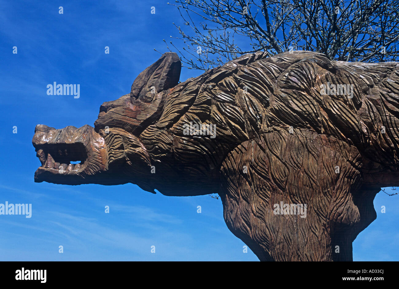 At Saugues en Gévaudun looms a vast woodcarving of the Beast of Gévaudun which terrorised 18th-century Auvergne country folk Stock Photo