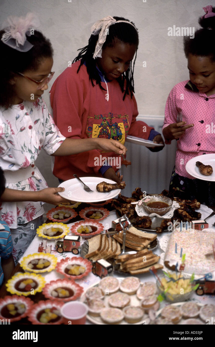 Children at a birthday party eating food Stock Photo - Alamy