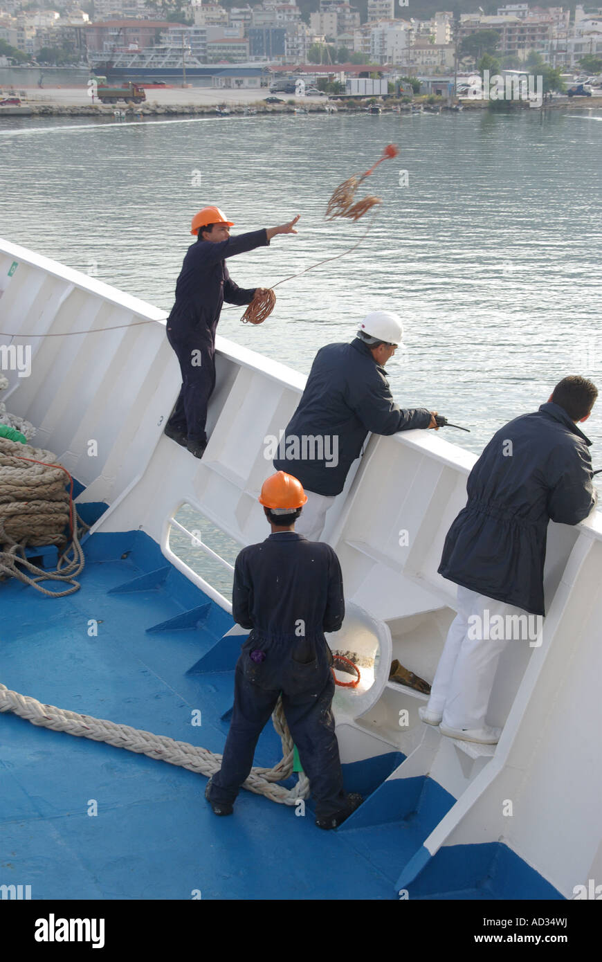 Cruise liner docking procedure seaman throwing weighted ball & thin