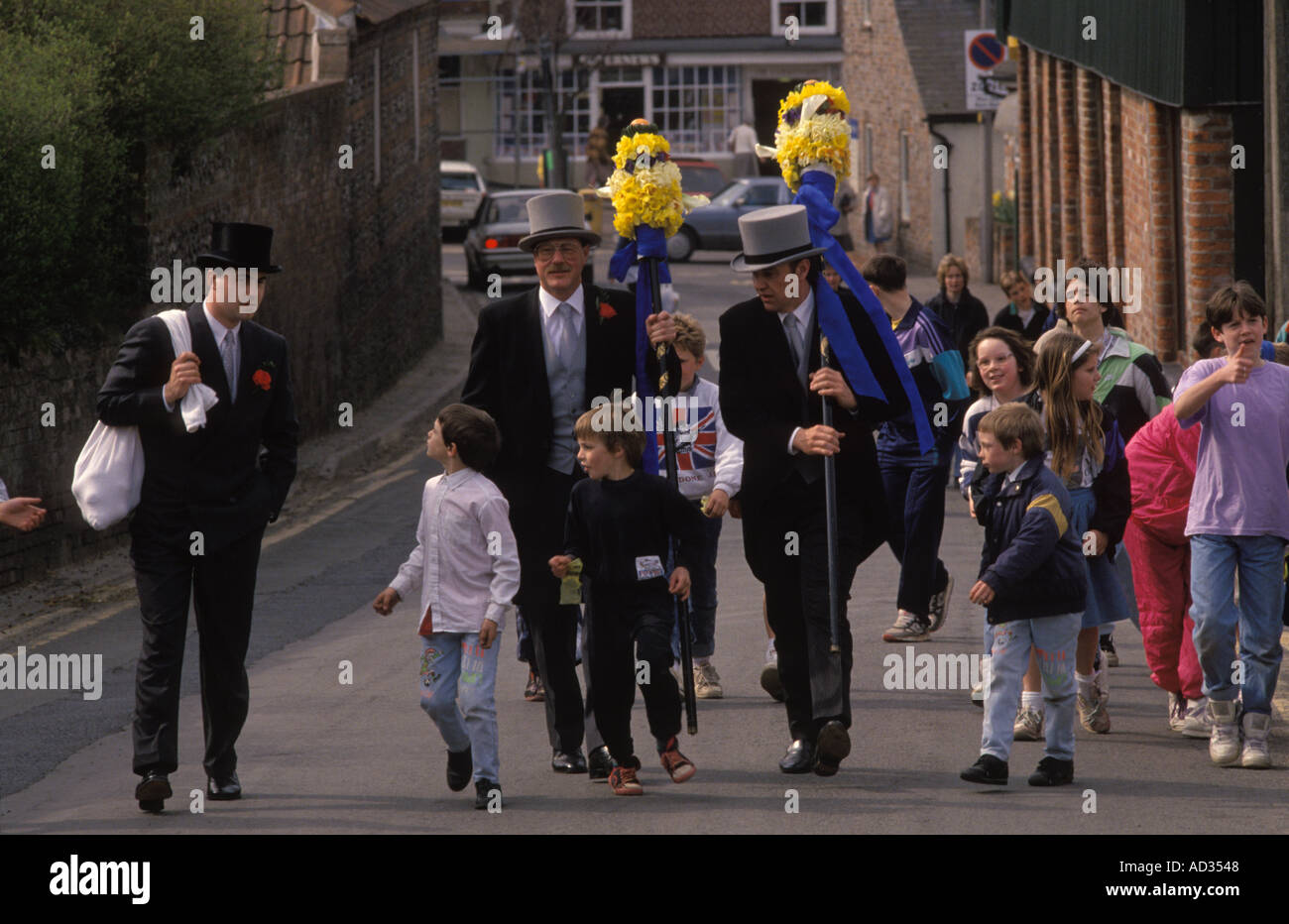 Hungerford Hocktide, Berkshire. Tuttimen on the second Tuesday after Easter parade through the market town children get oranges. 1980s UK HOMER SYKES Stock Photo