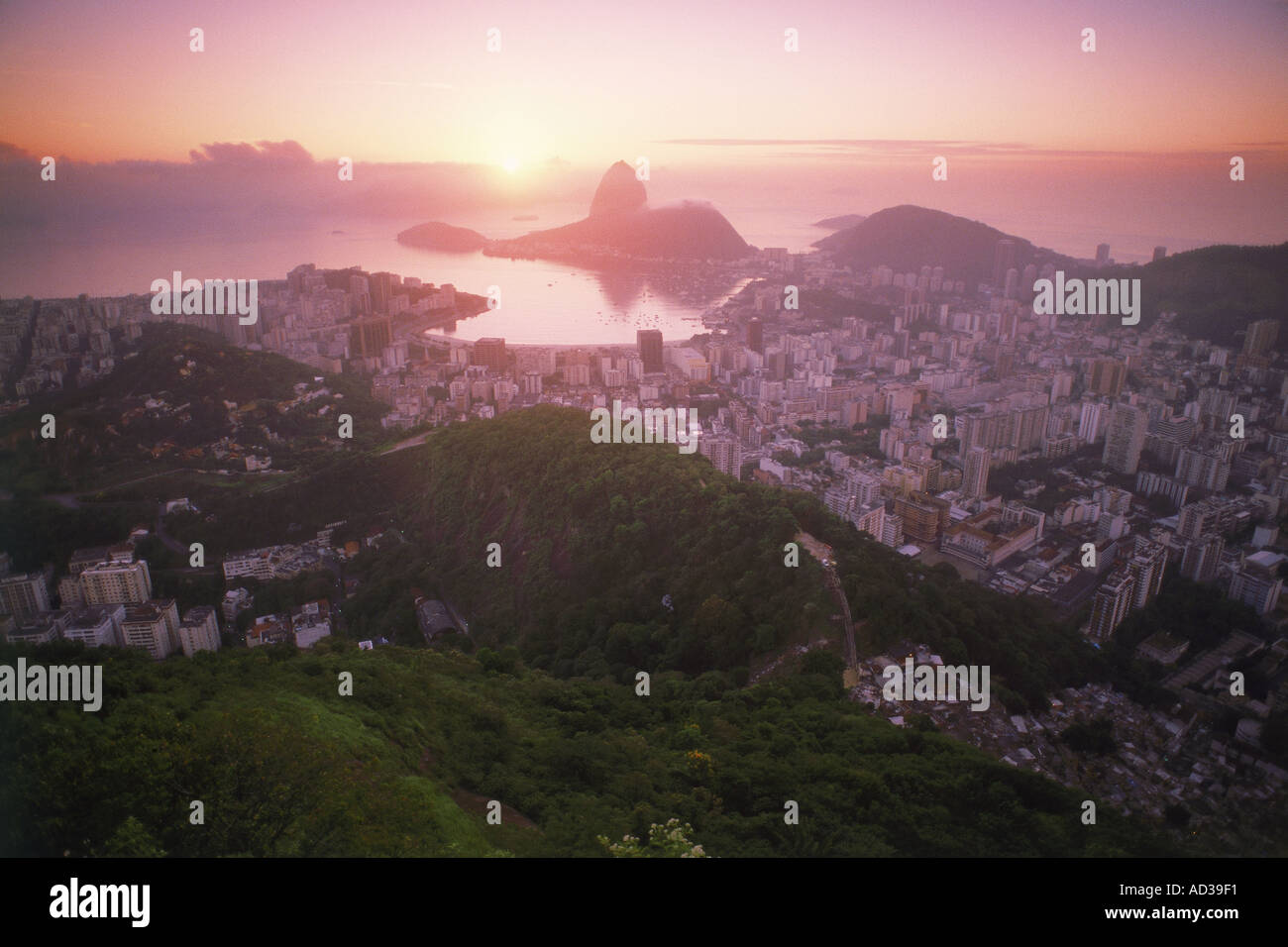 Above Pao de Acucar and Botofago Bay in Rio De Janeiro at sunrise Stock Photo