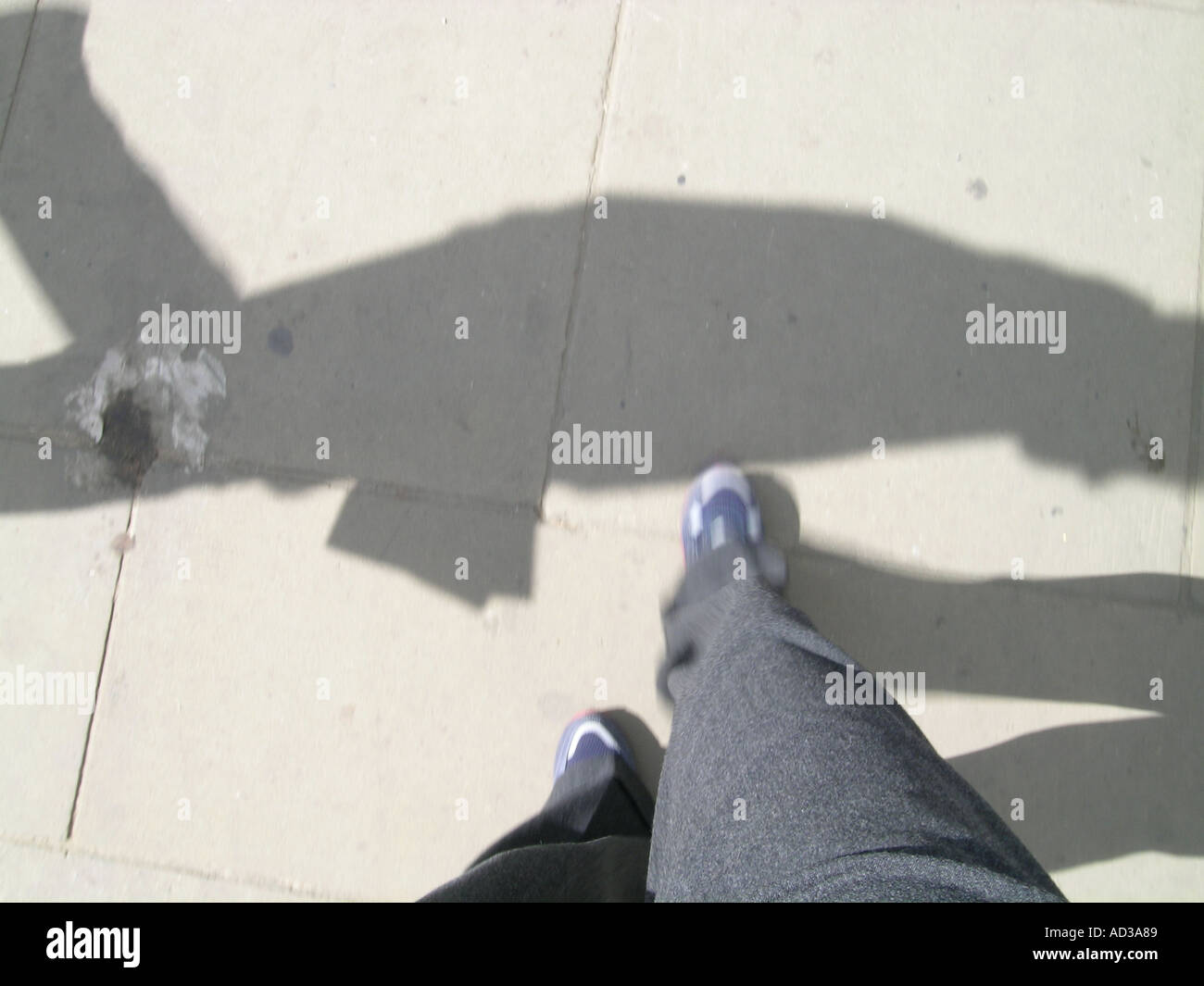 shadow & legs / walking on street Stock Photo Alamy