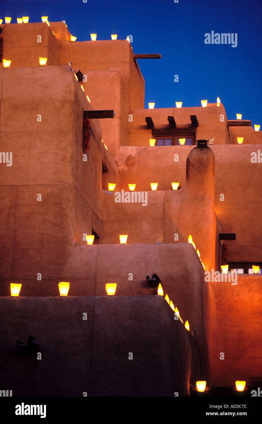 Festive farolito lights on famous Inn at Loretto hotel Santa Fe NM Stock Photo