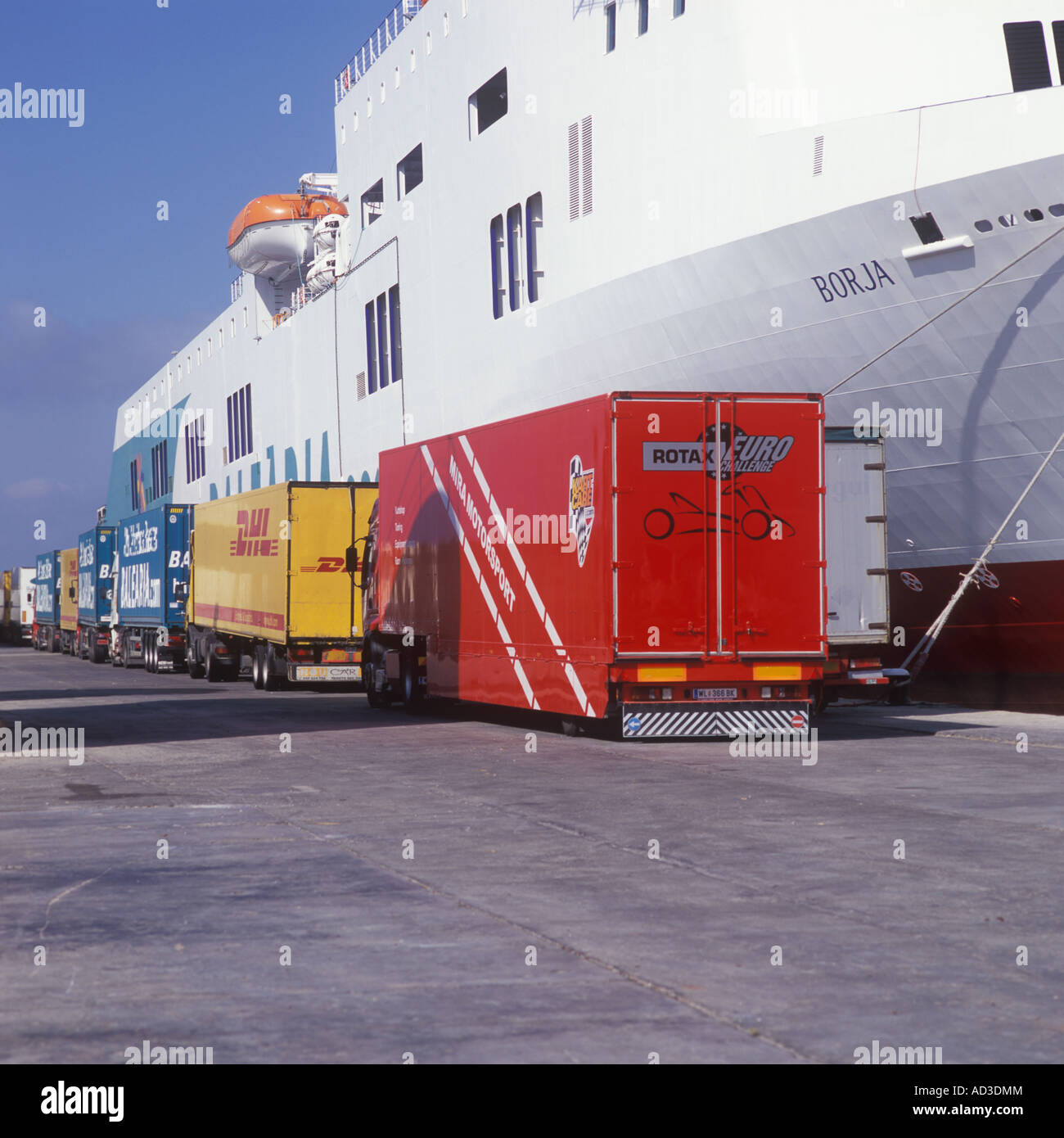 Parcel transport lorries lining up ready to embark on EUROLINEAS MARITIMAS S.A. Roll On Roll Off Cargo ferry "Borja" to Barcelon Stock Photo