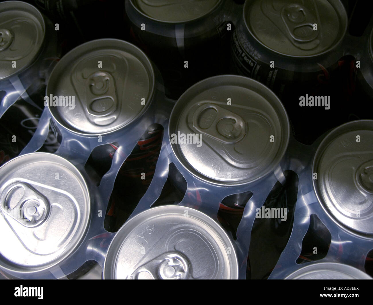 Pop top cans of carbonated beverages in a supermarket Stock Photo Alamy