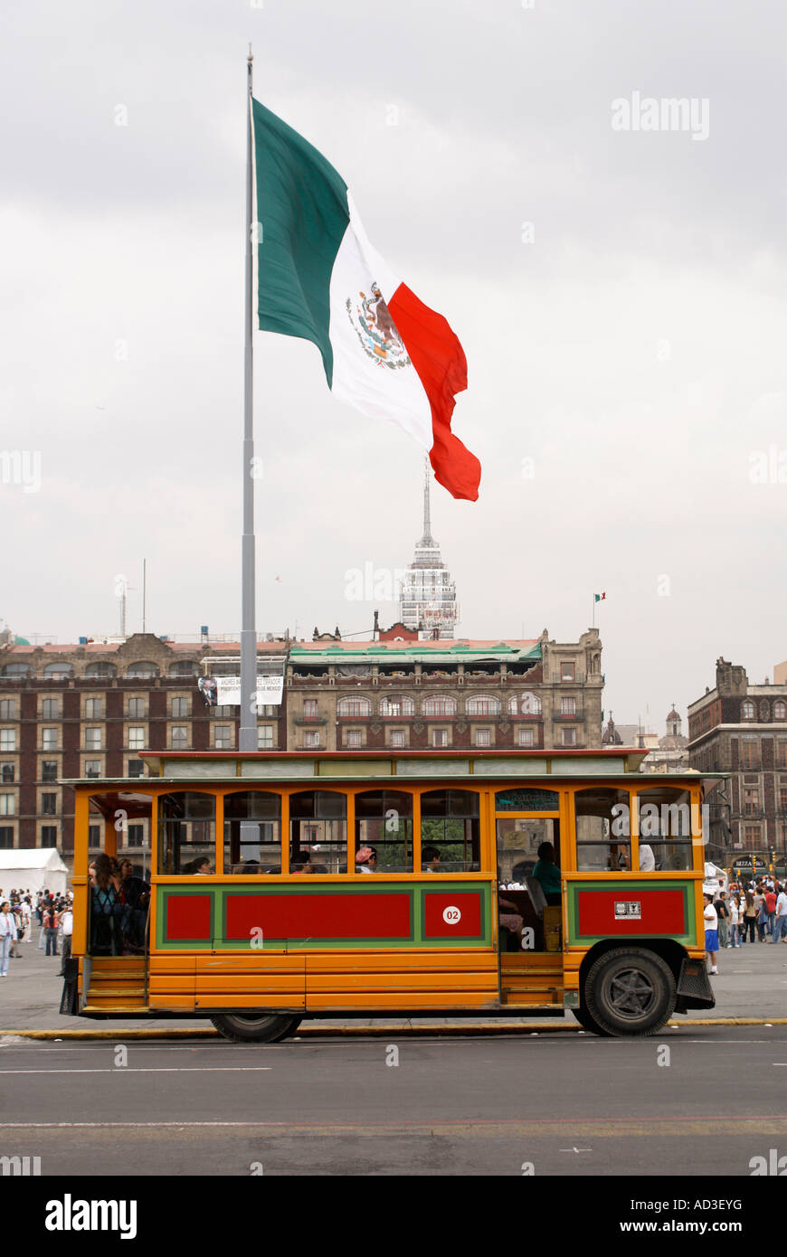 Tourist sightseeing trolley parked next to the Zocalo in Mexico City Stock Photo