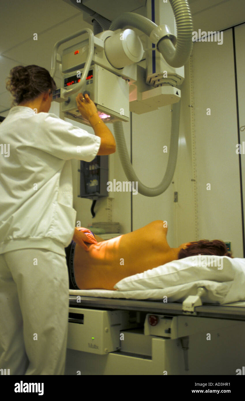Making an xray of a woman s back Stock Photo