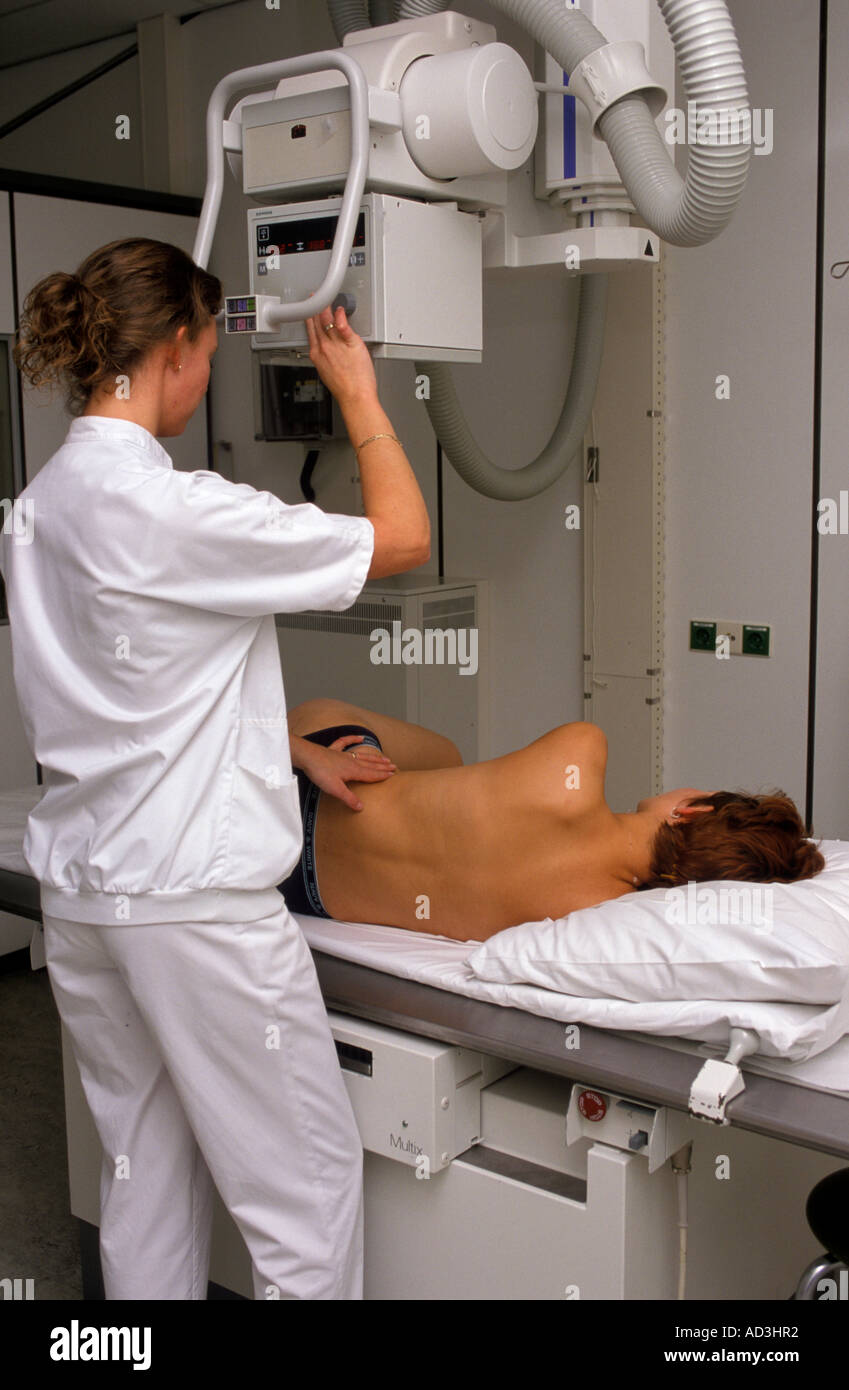 Making an xray of a woman s back Stock Photo