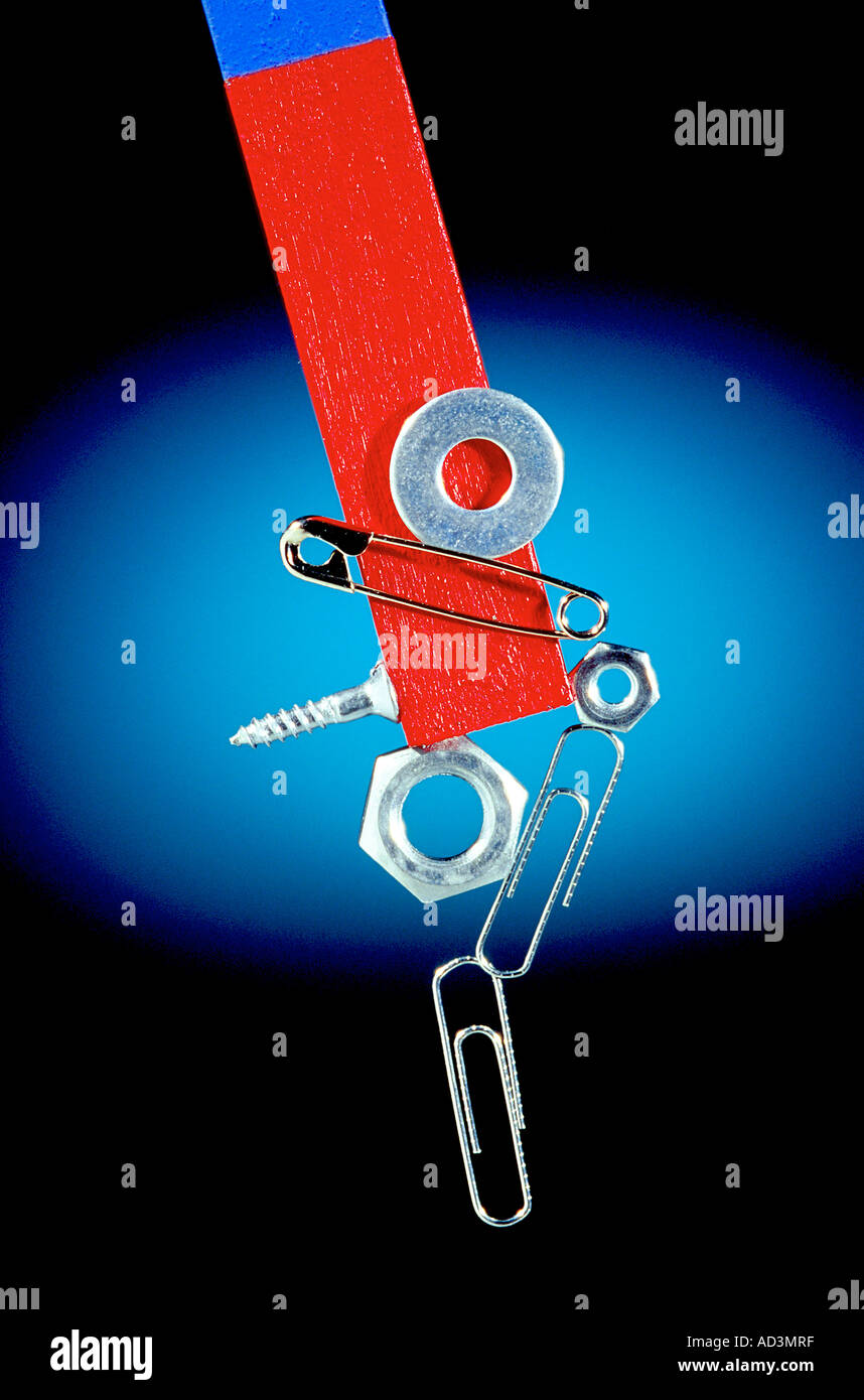 Bar Magnet Attracting Ferrous Material Stock Photo