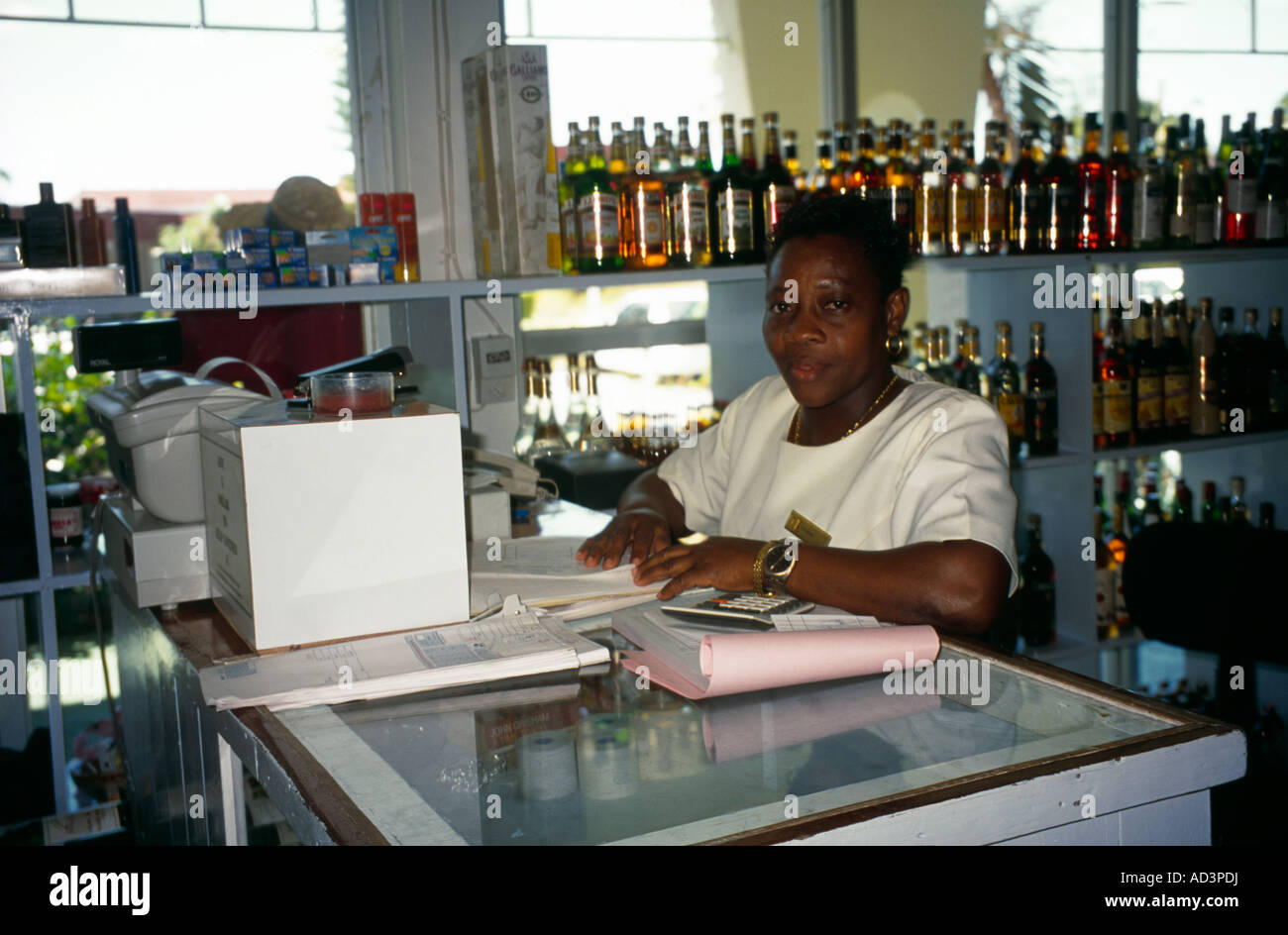 Dickenson Bay Antigua Supermarket / Post Office Woman Working Stock Photo