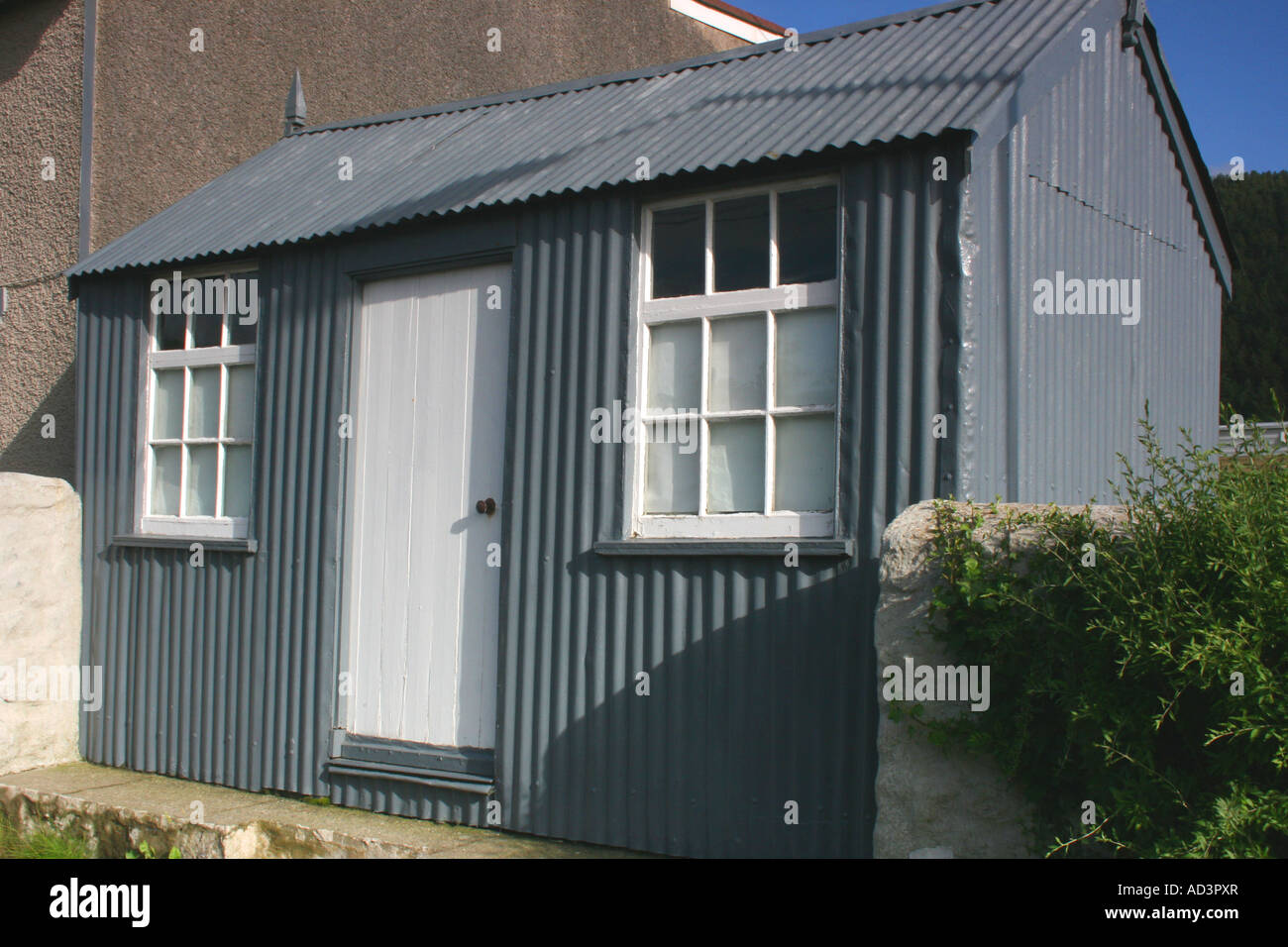 Small grey corrugated tin hut near Clarach Bay in Wales Stock Photo Alamy