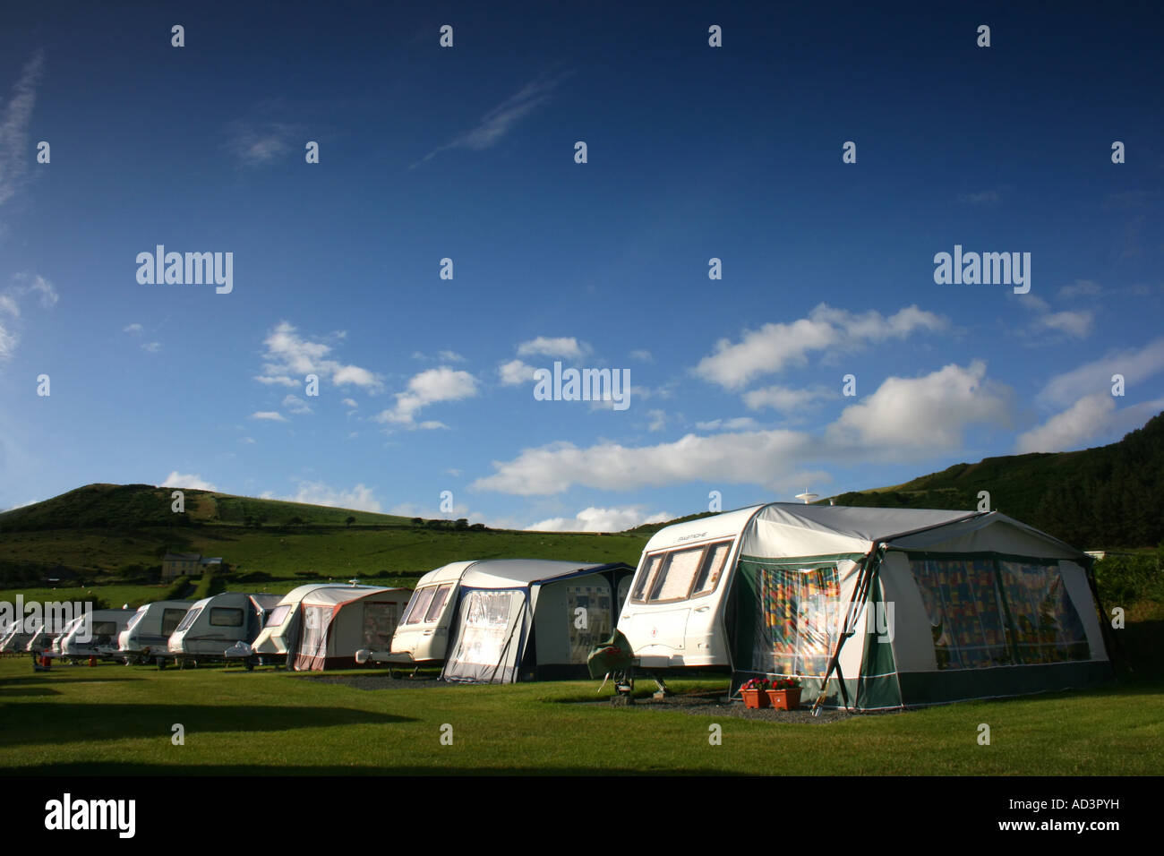 row of caravans in campsite at