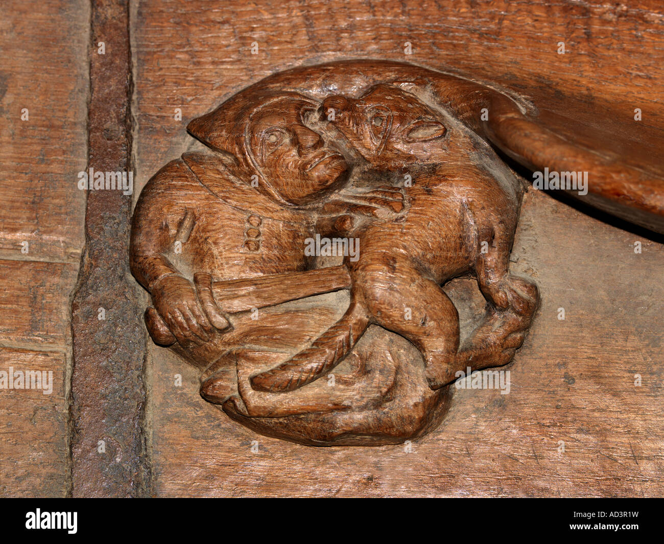Winchester Hampshire Winchester Cathedral Misericord of a Man Fghting a Wild Animal in the Quire Stock Photo