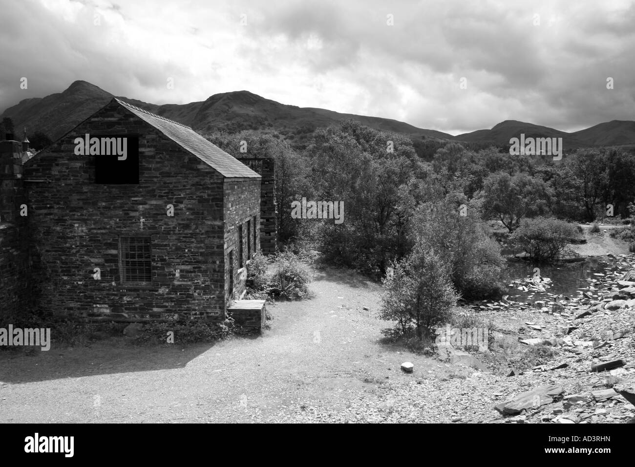 Old stone building next to Llyn Padarn Lake, Gwynedd, North Wales Stock