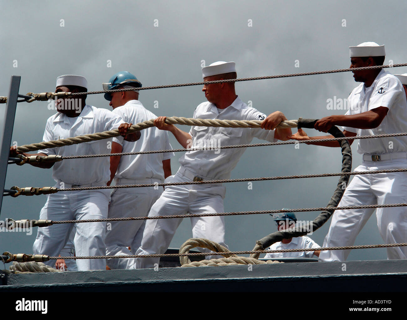 Pearl Harbor, Hawaii (May 5, 2006) Sailors heave around on a mooring