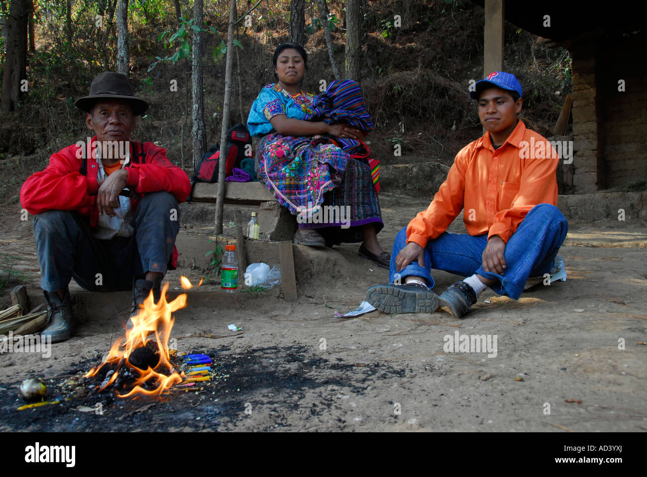Shaman holding Mayan rituals at Pascal Abaj's Hill in Chichicastenango, Guatemala, Central America Stock Photo