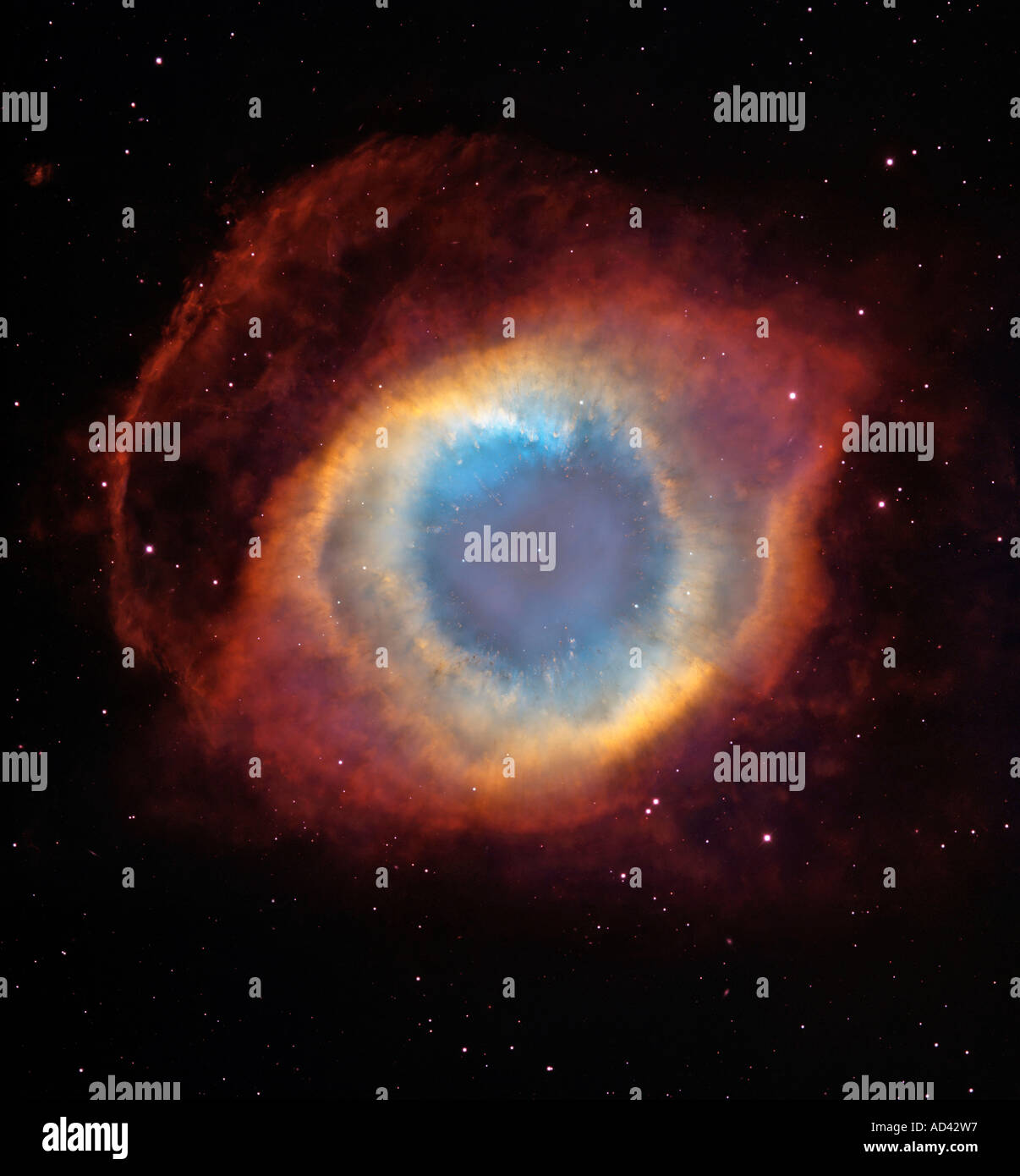 This composite image is a view of the colorful Helix Nebula Stock Photo