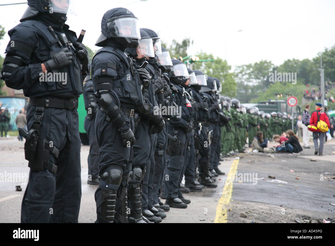 Lined up police officers with helmets on a police intervention, Heiligendamm, Rostock, Germany Stock Photo