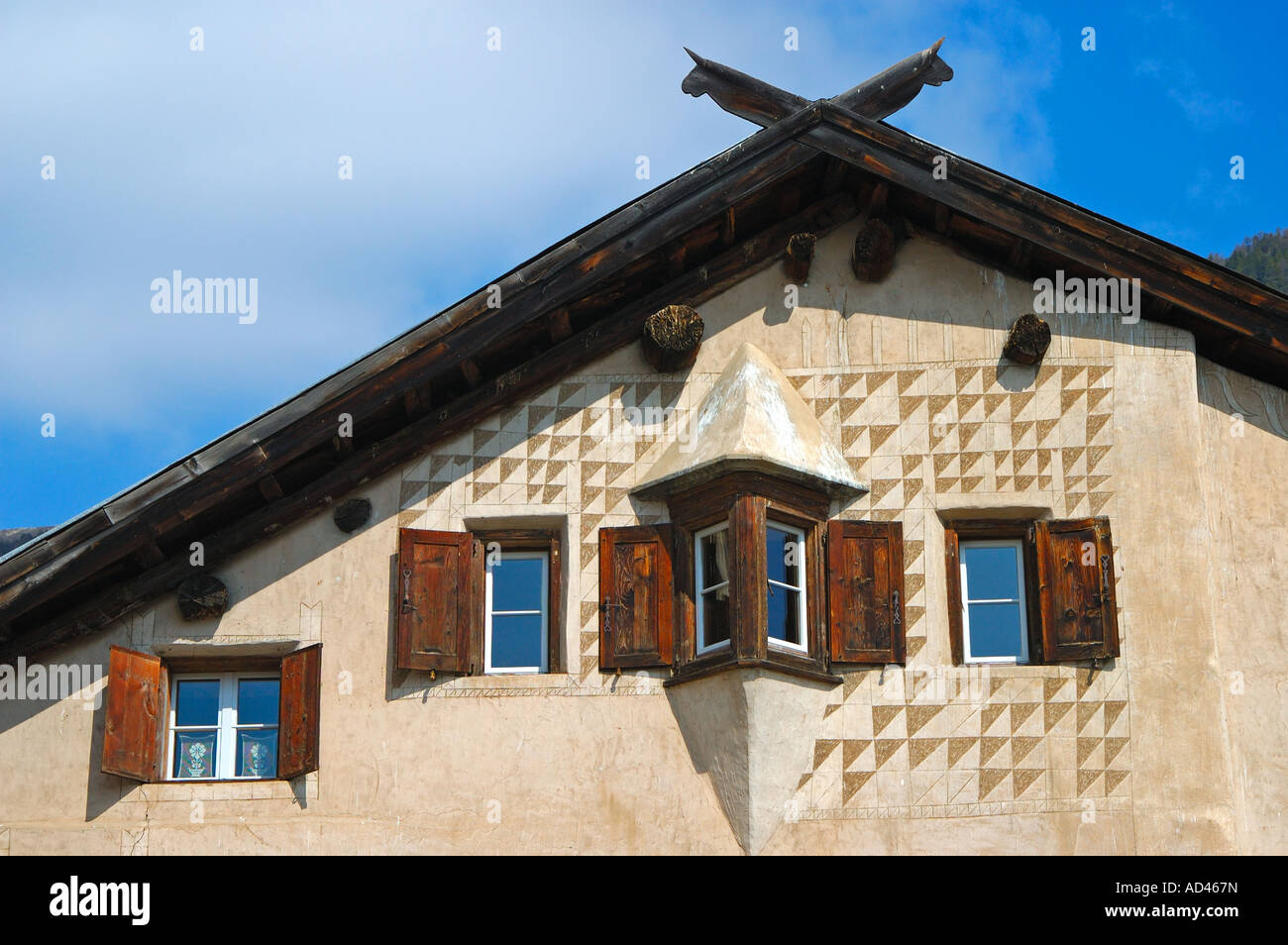 Facade of a typical Engadine house decorated with Sgraffito ornaments, Samedan, Engadin, Grisons, Switzerland Stock Photo