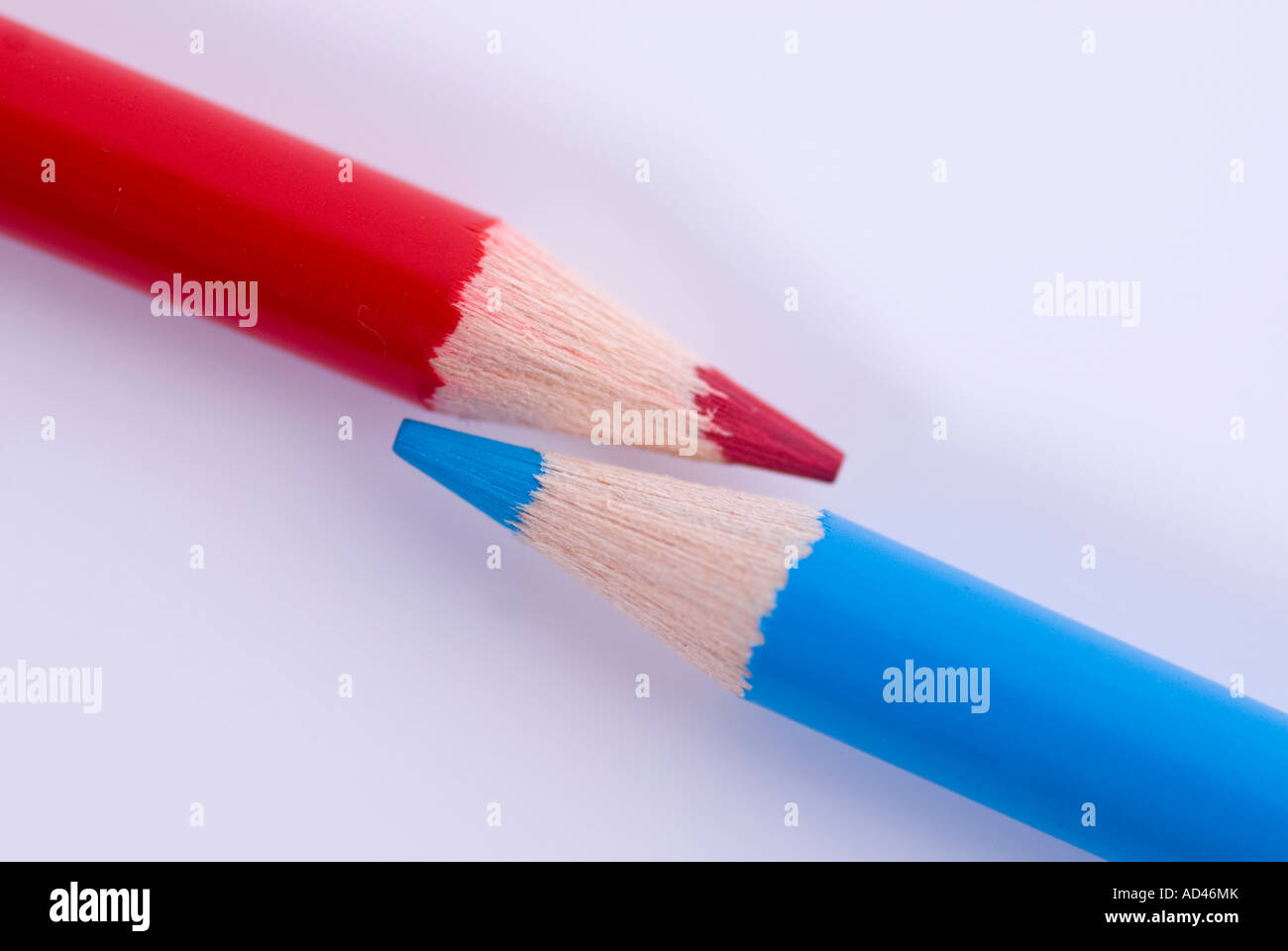 Red and blue pencils Stock Photo Alamy