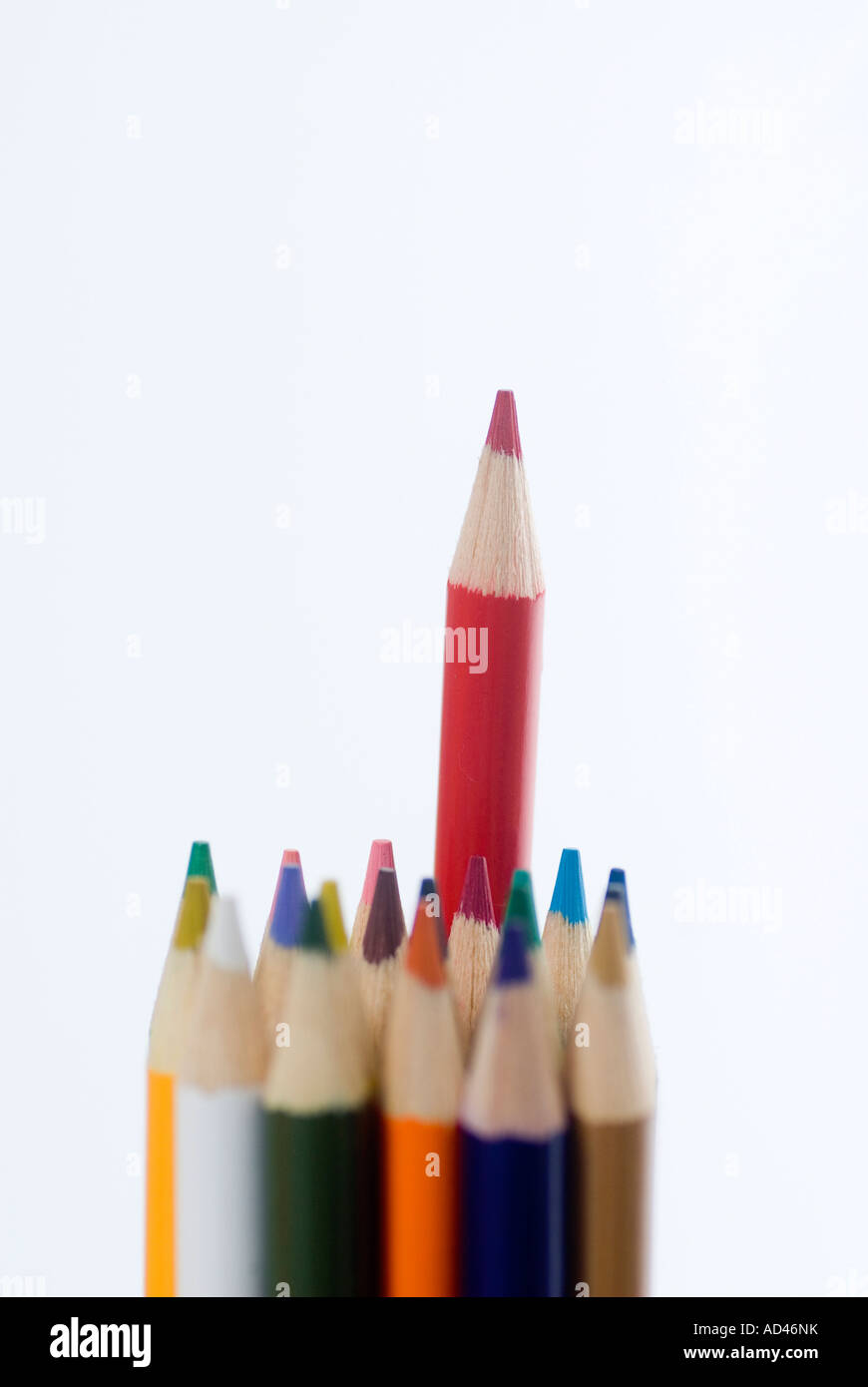Red pencil standing out from the crowd Stock Photo