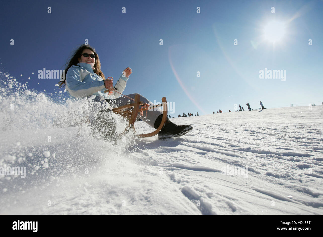 Girl is sledding, Hoherodskopf, Hesse, Germany Stock Photo Alamy