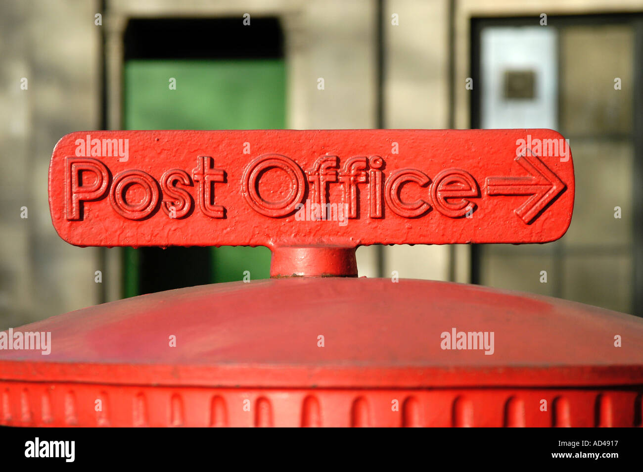 Post Office sign on red post box, England, UK Stock Photo