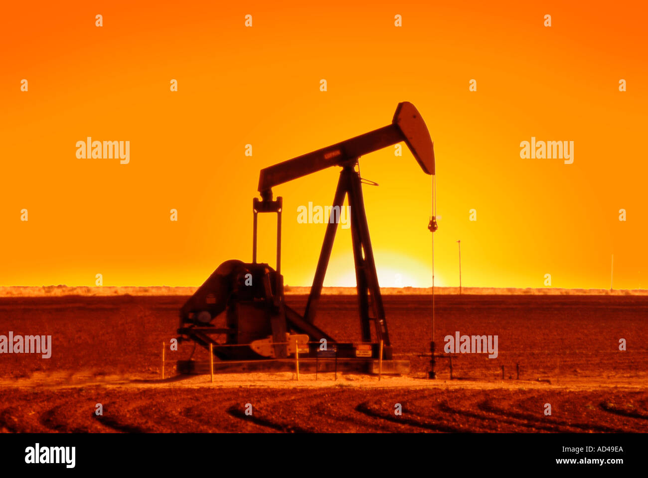 Oil derrick pump pumping oil in west Texas Stock Photo Alamy