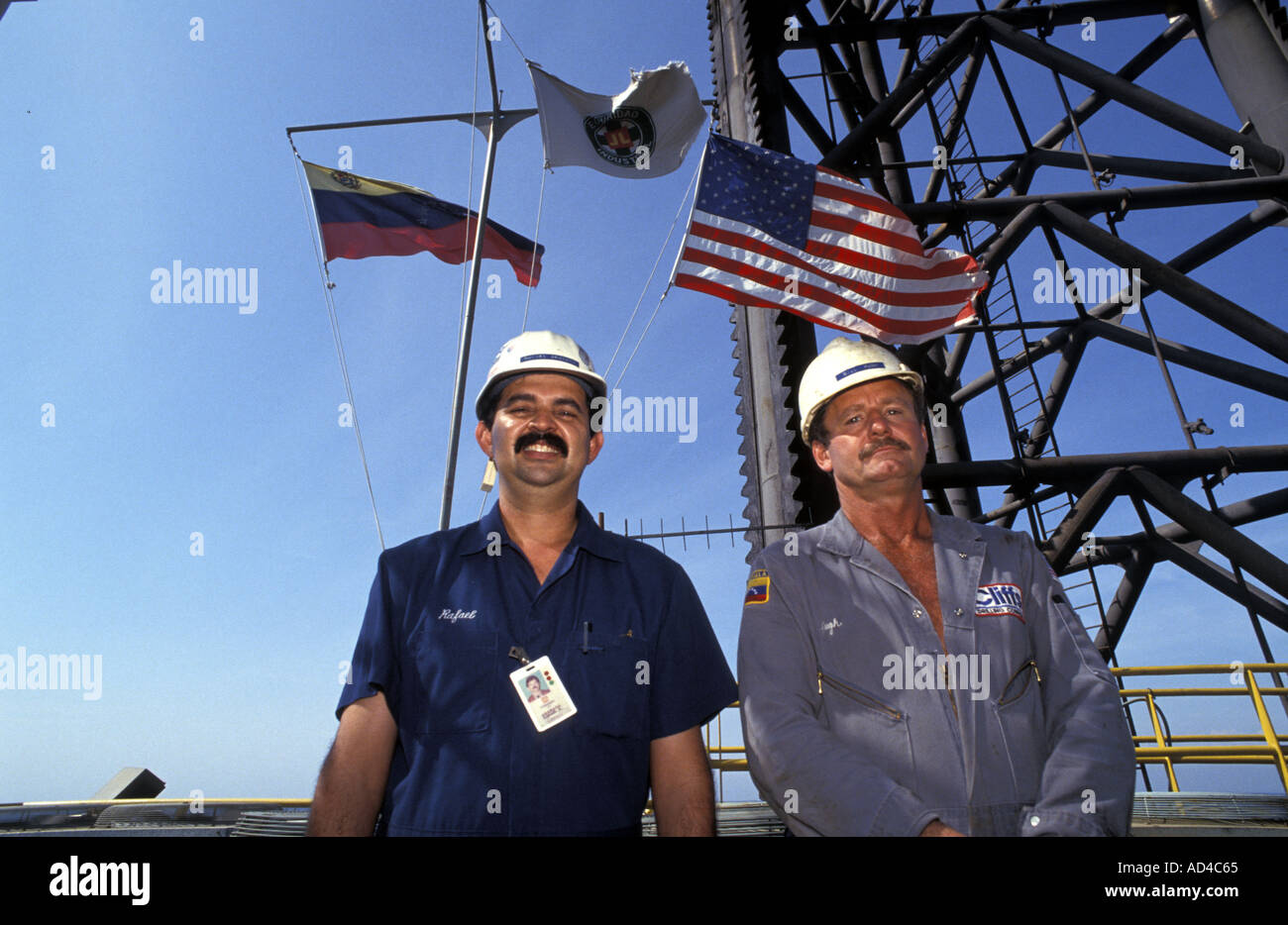 VENEZUELA VENEZUELAN AND AMERICAN OIL WORKERS ON A PLATFORM ON LAKE MARACAIBO Stock Photo