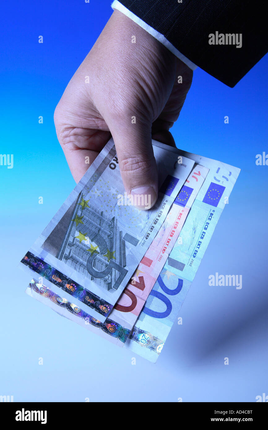 Hand holds euro banknotes Stock Photo