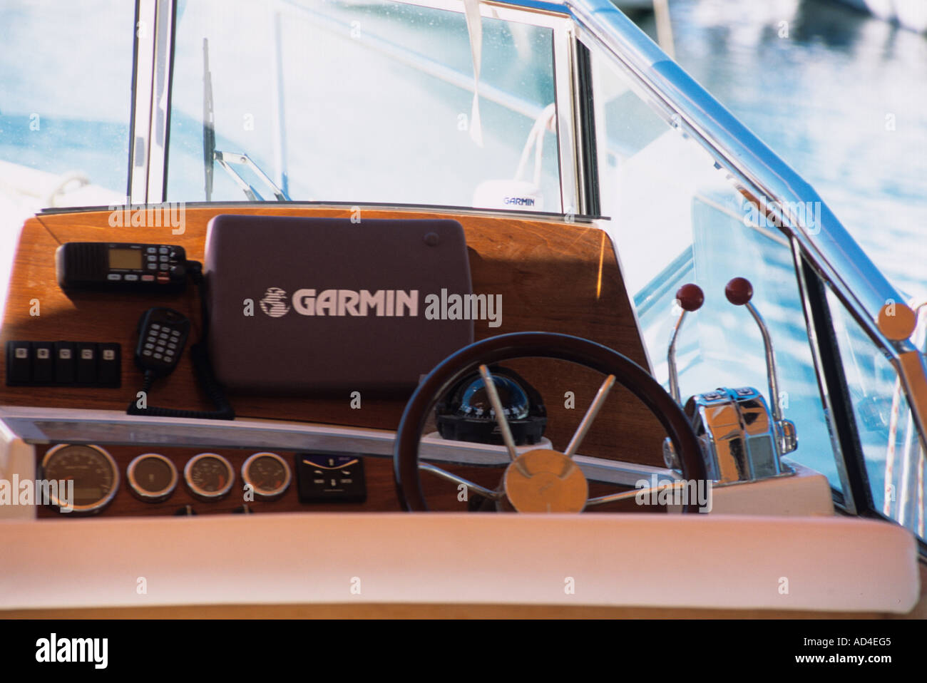 cockpit / wheelhouse of motor boat showing steering position and modern