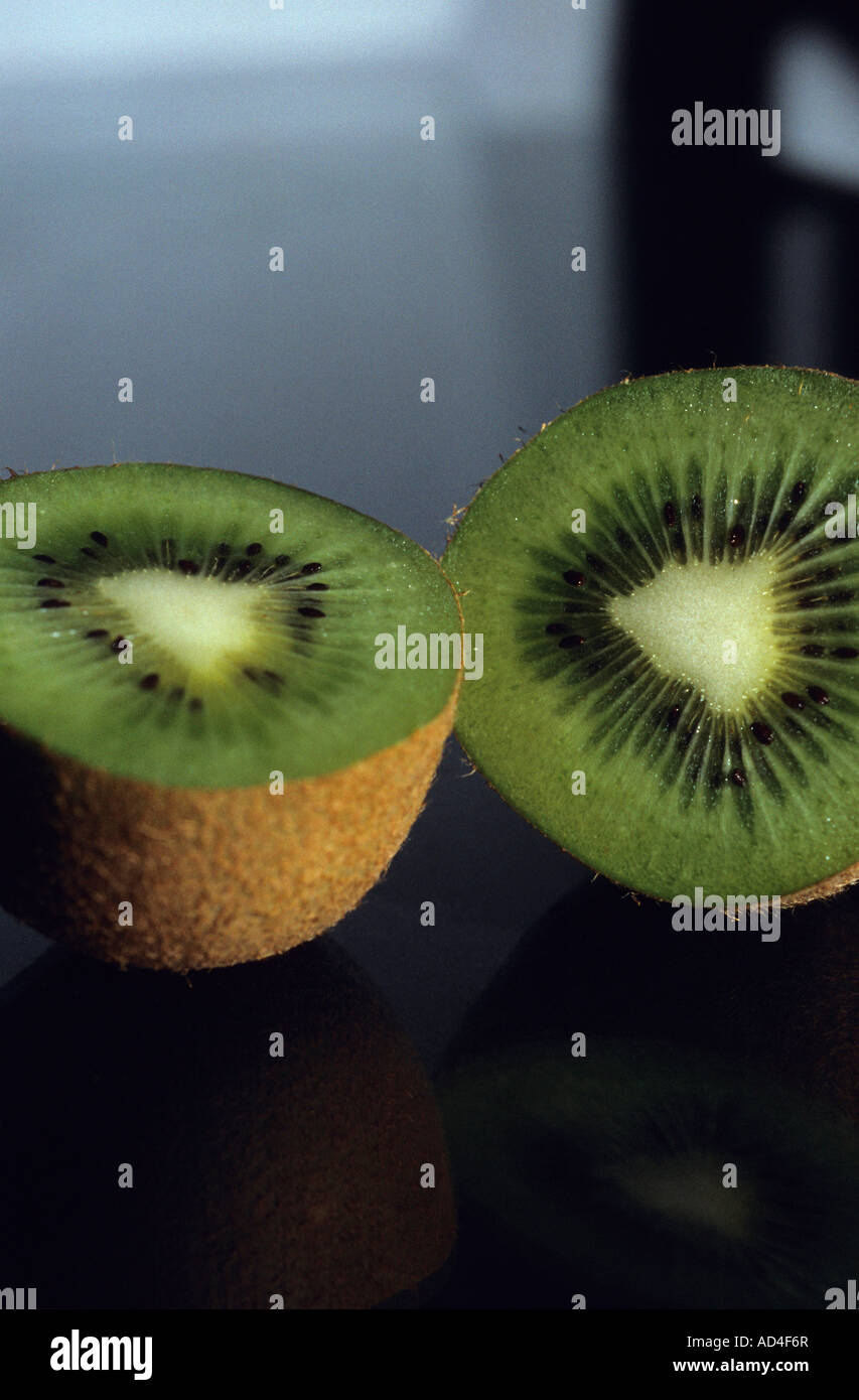 A kiwi fruit cut in half Stock Photo Alamy