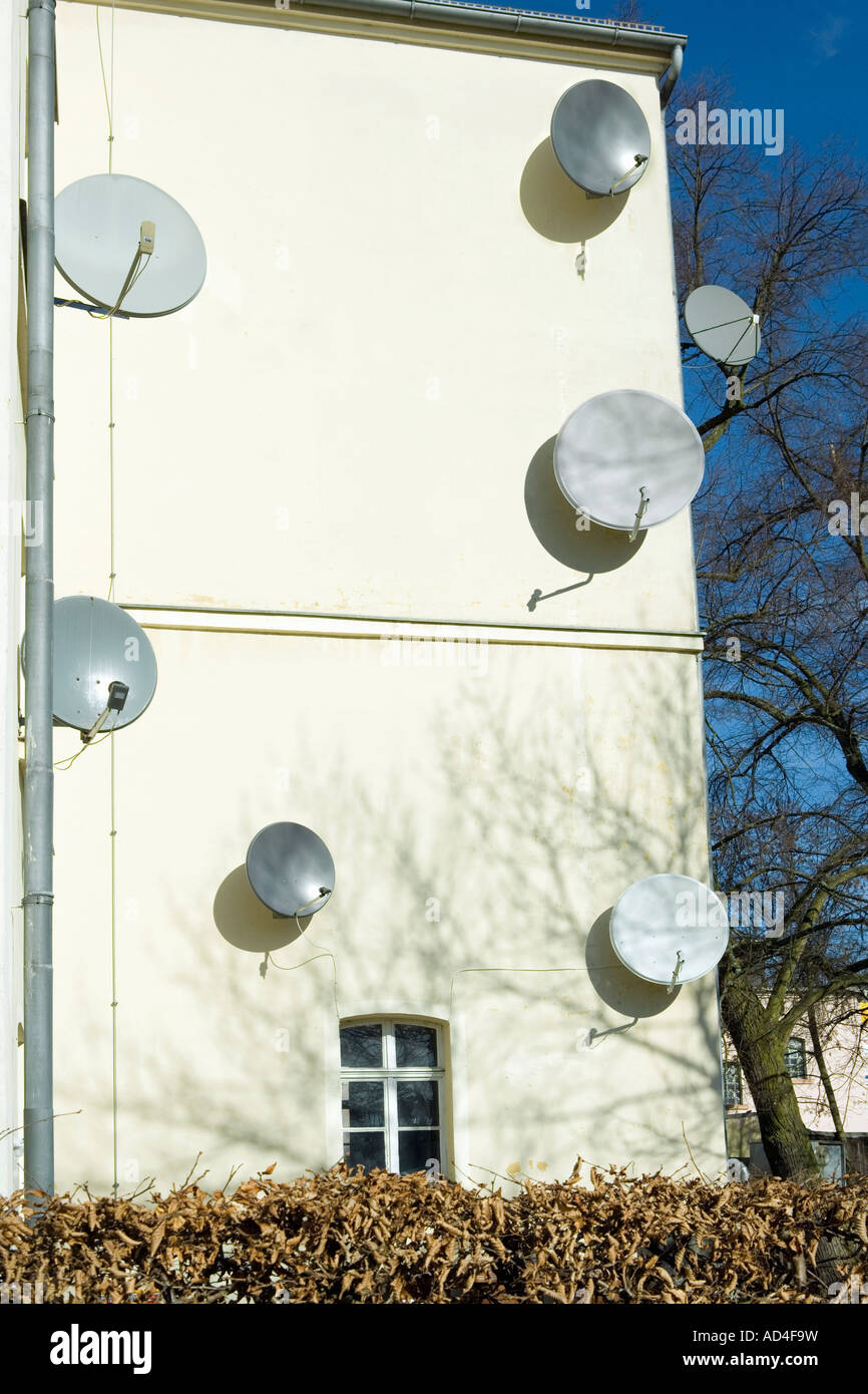 Satellite dishes on the side of a building Stock Photo Alamy