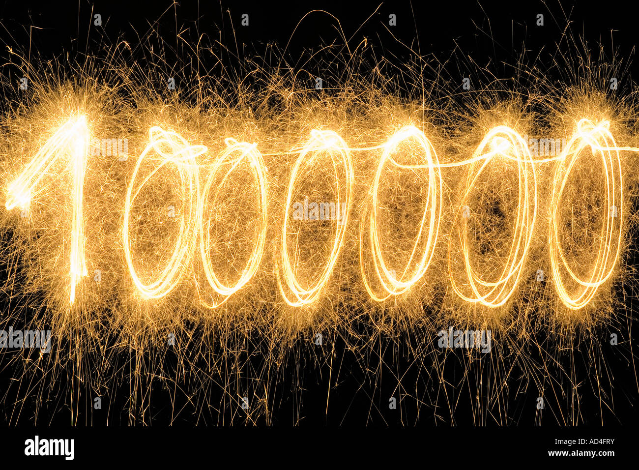1000000' drawn with a sparkler Stock Photo
