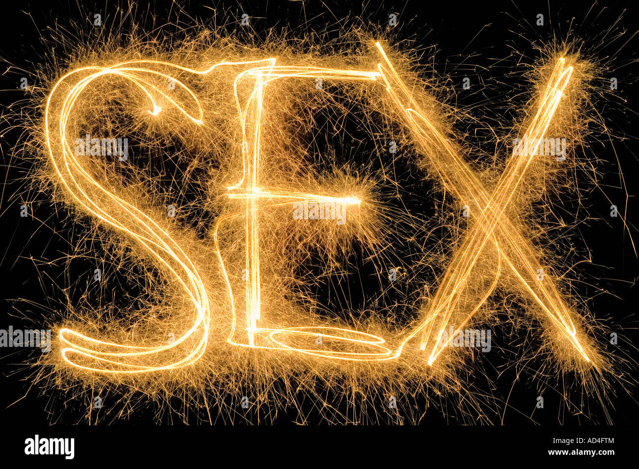 Sex' drawn with a sparkler Stock Photo