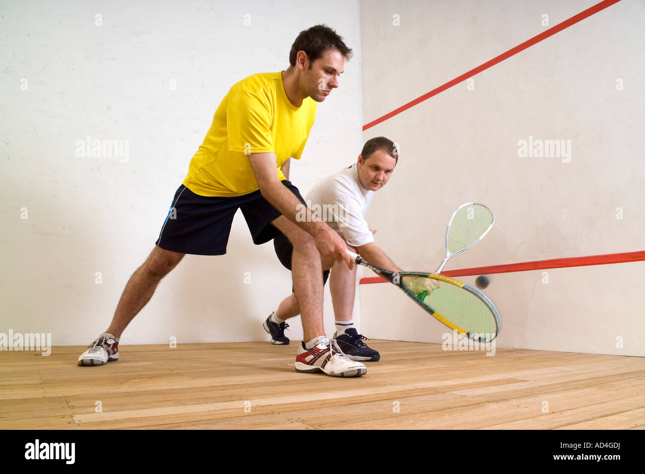 Two men playing squash Stock Photo