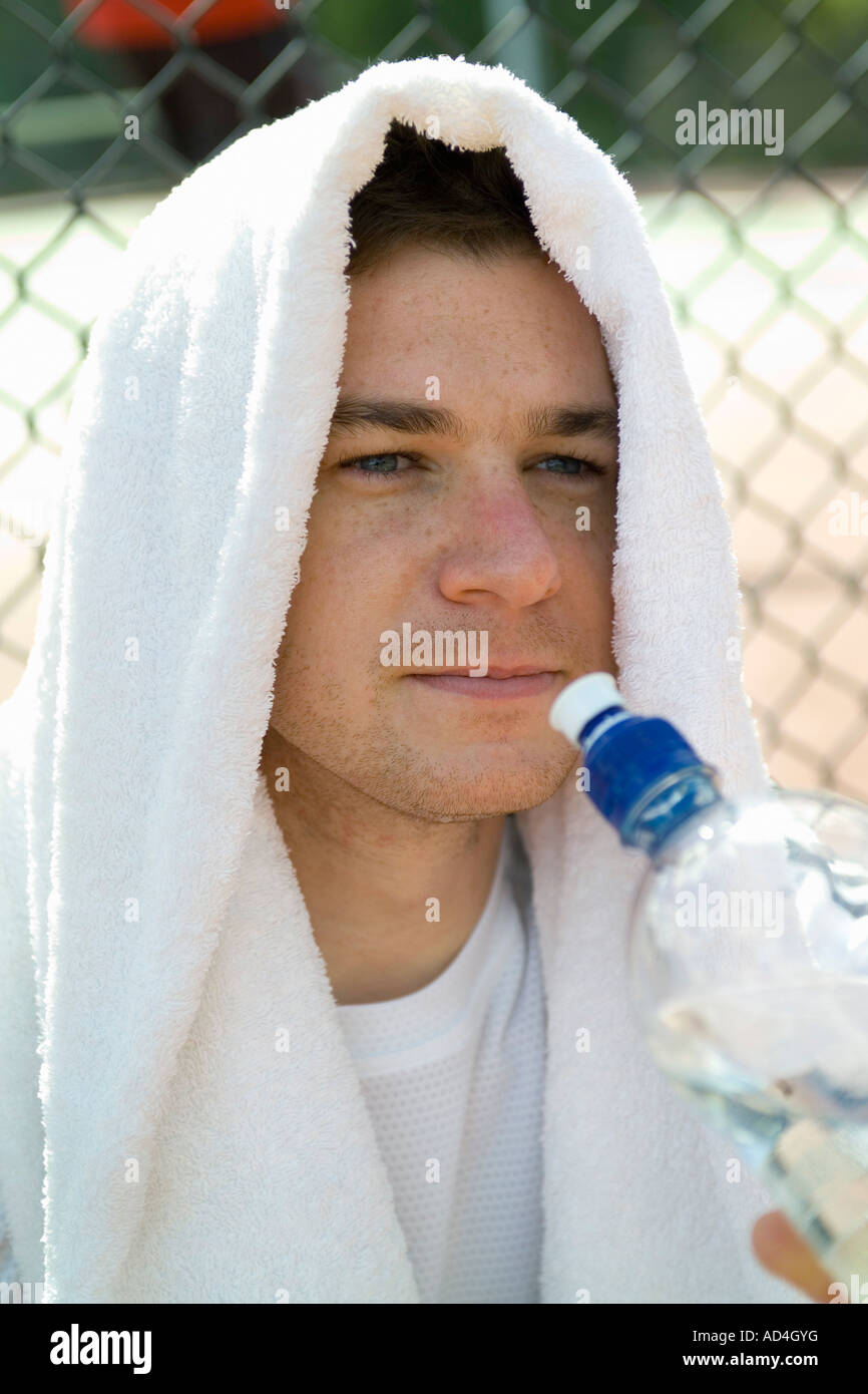 A man drinking from a water bottle Stock Photo Alamy