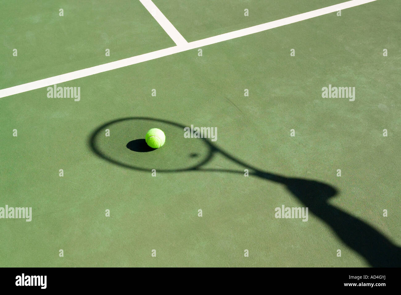 Shadow of a tennis racquet on a tennis court Stock Photo Alamy