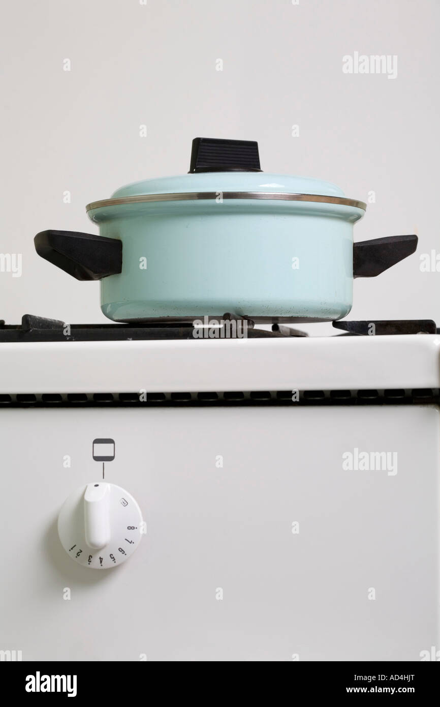 A saucepan on a stove Stock Photo