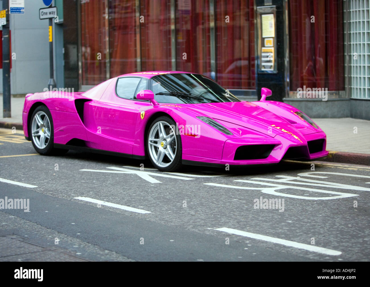 Pink Ferrari enzo parked outside restaurant in Leeds Stock Photo - Alamy