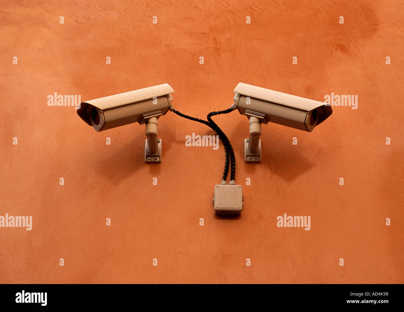 Surveillance cameras on a wall Stock Photo Alamy