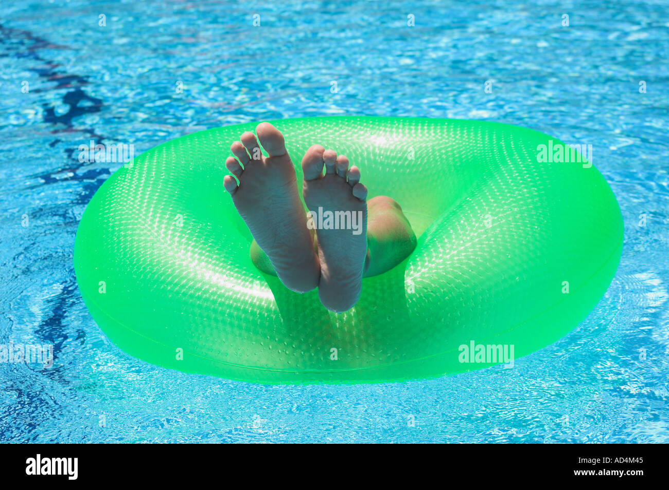 legs on the floater Stock Photo Alamy