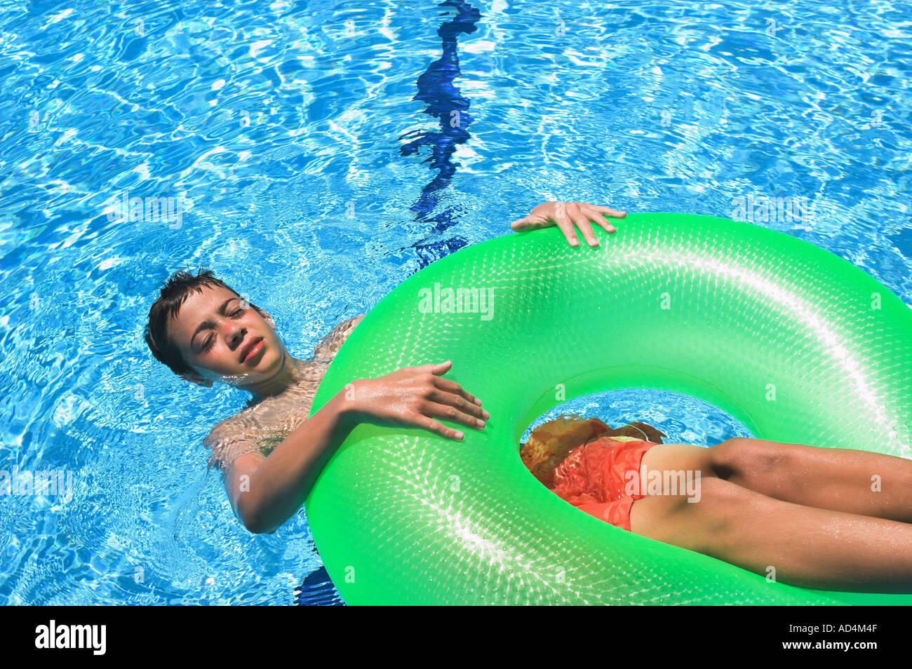 legs on the floater Stock Photo Alamy